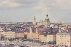 City With A Large Building And A Clock Tower