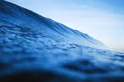 Large Wave Is Seen In The Blue Sky
