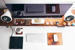 Desk With A Keyboard, Mouse, And A Monitor