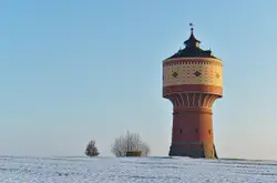 Large White Building With A Large Clock On Top