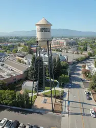 Large White Clock Tower On A Street