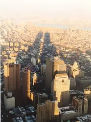 Cityscape With A Large Building And A Cityscape