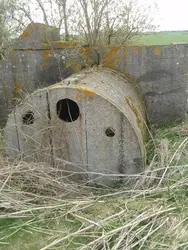 Large Metal Structure With A Wall And A Fence