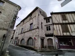 Building With A Clock On The Side Of It