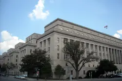 Large Building With A Large Clock On It