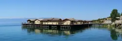 Small Wooden House With A Large Wooden Dock