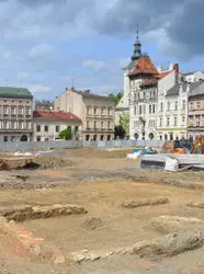 City With A Large Building And A Clock Tower
