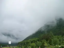 Large Mountain With A Cloudy Sky