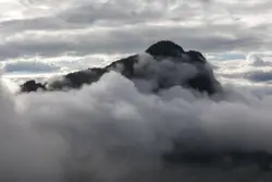 Mountain Range With A Cloud Of Smoke