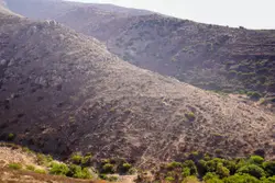 Mountain Range With A Steep Hill