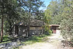 Small Building With A Fence And A Fence