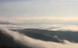Mountain Range With A Cloudy Sky