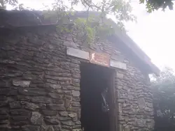 Building With A Clock On The Side Of It