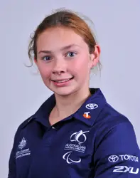 Young Woman Smiling And Posing For A Picture