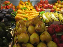 Fruit Stand With A Variety Of Fruits And Vegetables
