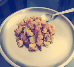 Plate Of Food With A Fork And Spoon