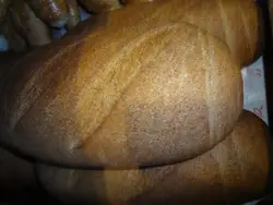 Large Piece Of Bread On A Table