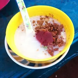 Bowl Of Food With A Spoon And A Bowl Of Water