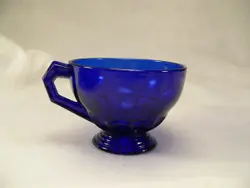 Blue And White Cup Sitting On A Table