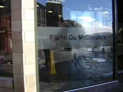 Sign That Is On The Side Of A Building