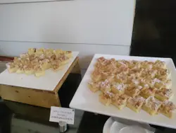 Table Topped With A Cake And A Plate Of Food