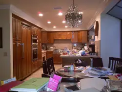 Kitchen With A Stove, Sink, And A Refrigerator