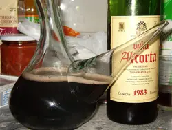 Bottle Of Alcohol And A Bottle Of Wine