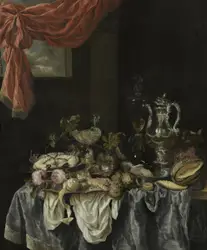 Table Topped With A Vase Filled With Flowers