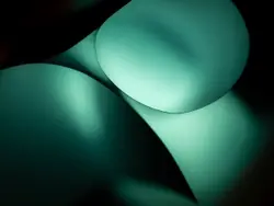 Close Up Picture Of A Green Object In The Dark