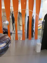 Pair Of Black And White Skateboards Are On A Table