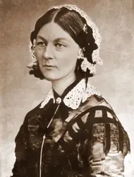 Woman Wearing A Hat And A Bow Tie