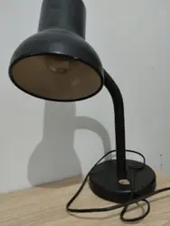 Lamp Is Lit Up On A Wall