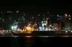 Large Boat Is Traveling Down The Water