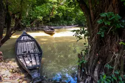 Small Boat Is Sitting In The Water