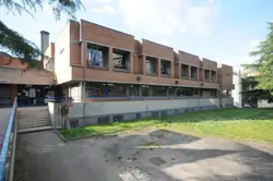 Building With A Large Building On The Side