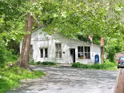 House With A Large Window And A Small House