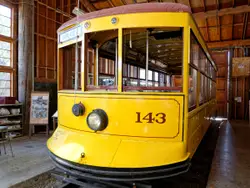Yellow And Yellow Train Sitting In A Train Station