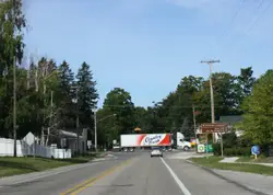 Street With A Stop Sign And A Gas Station