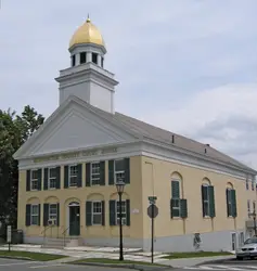 Large Building With A Clock On The Front