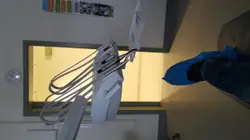 Pair Of Scissors Hanging On A Wall