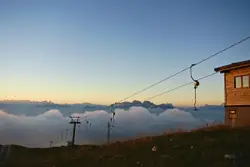 Mountain Range With A Building On Top Of It