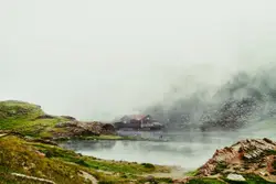 Large Stream Of Water With A Mountain