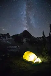 White Tent With A Black And White Object In The Middle