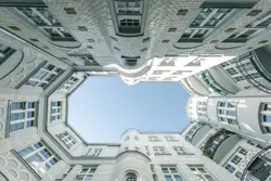 Large Building With A Large Mirror And A Building