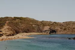 Rocky Beach With A Large Rock Wall