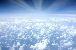 Large White Airplane Is Flying In The Sky