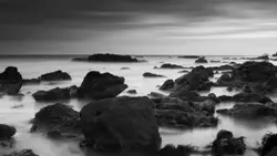 Rocky Outcrop With A Few Birds On It