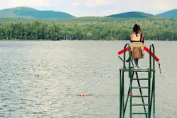 Woman Sitting On A Bench On A Boat