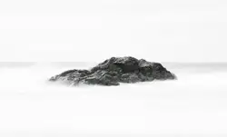 Mountain With A Cloud Of Snow On Top