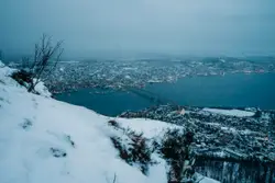 Snowy Mountain With A View Of The Water